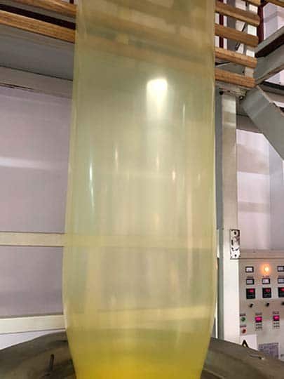 Production process of yellow VCI gas phase antirust film