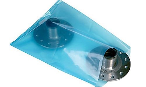 Two smooth metal products packed in light blue transparent VCI gas-phase anti-rust bags